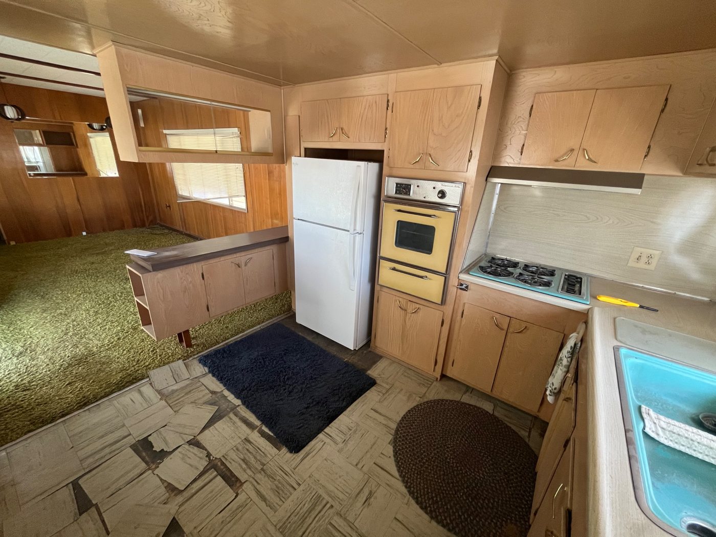 Original 1970s-era kitchen with decades of wear, purchased as-is by Infinite Legacy Property Solutions